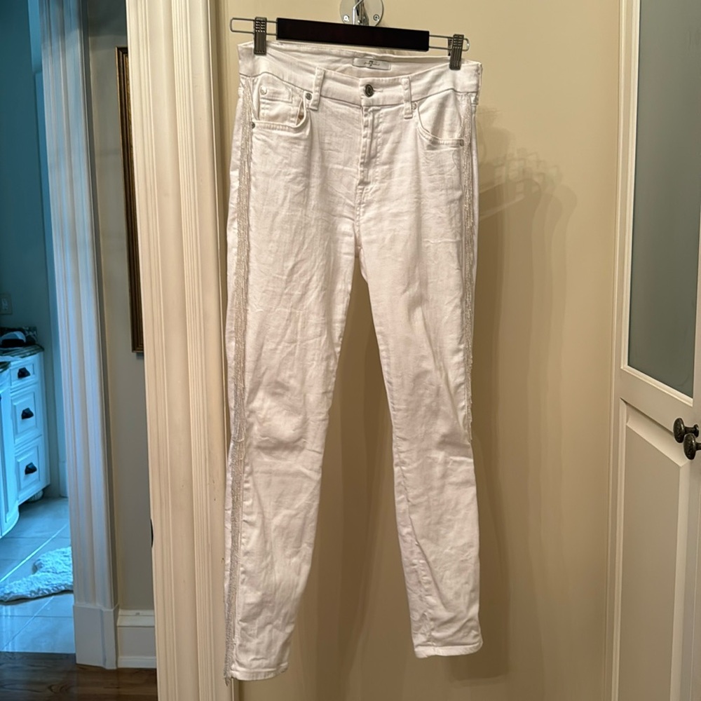 White jeans w/ tassel fringe on sides